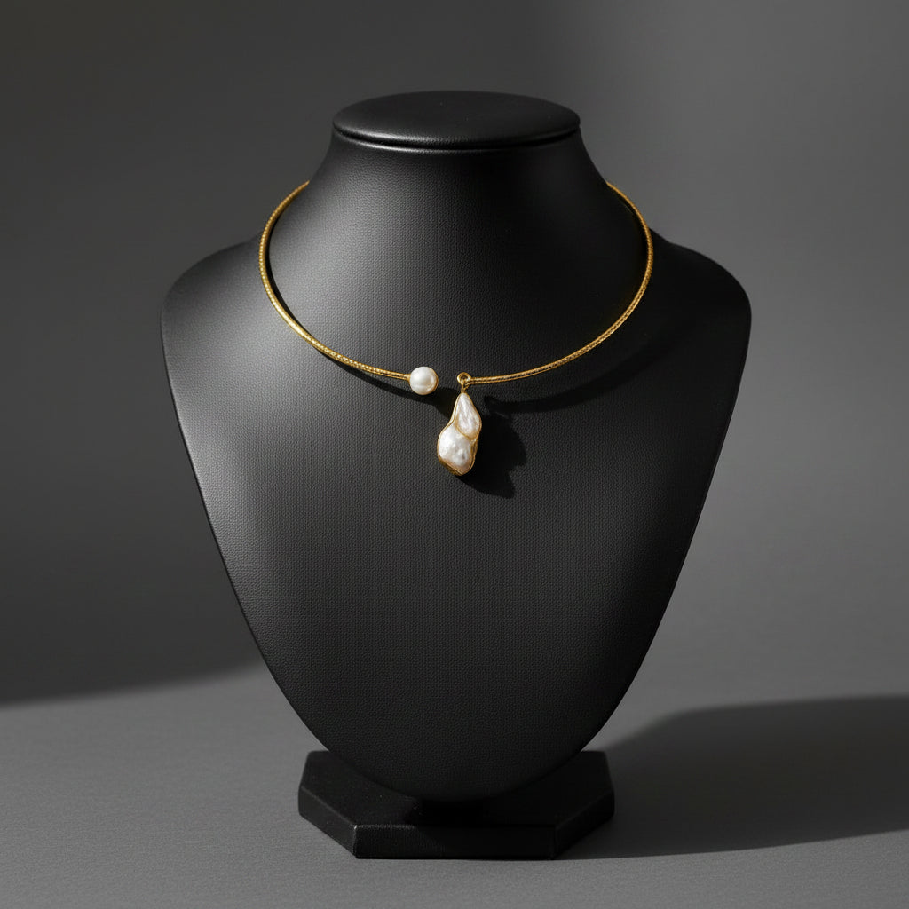 Hammered brass hasli necklace with baroque pearl