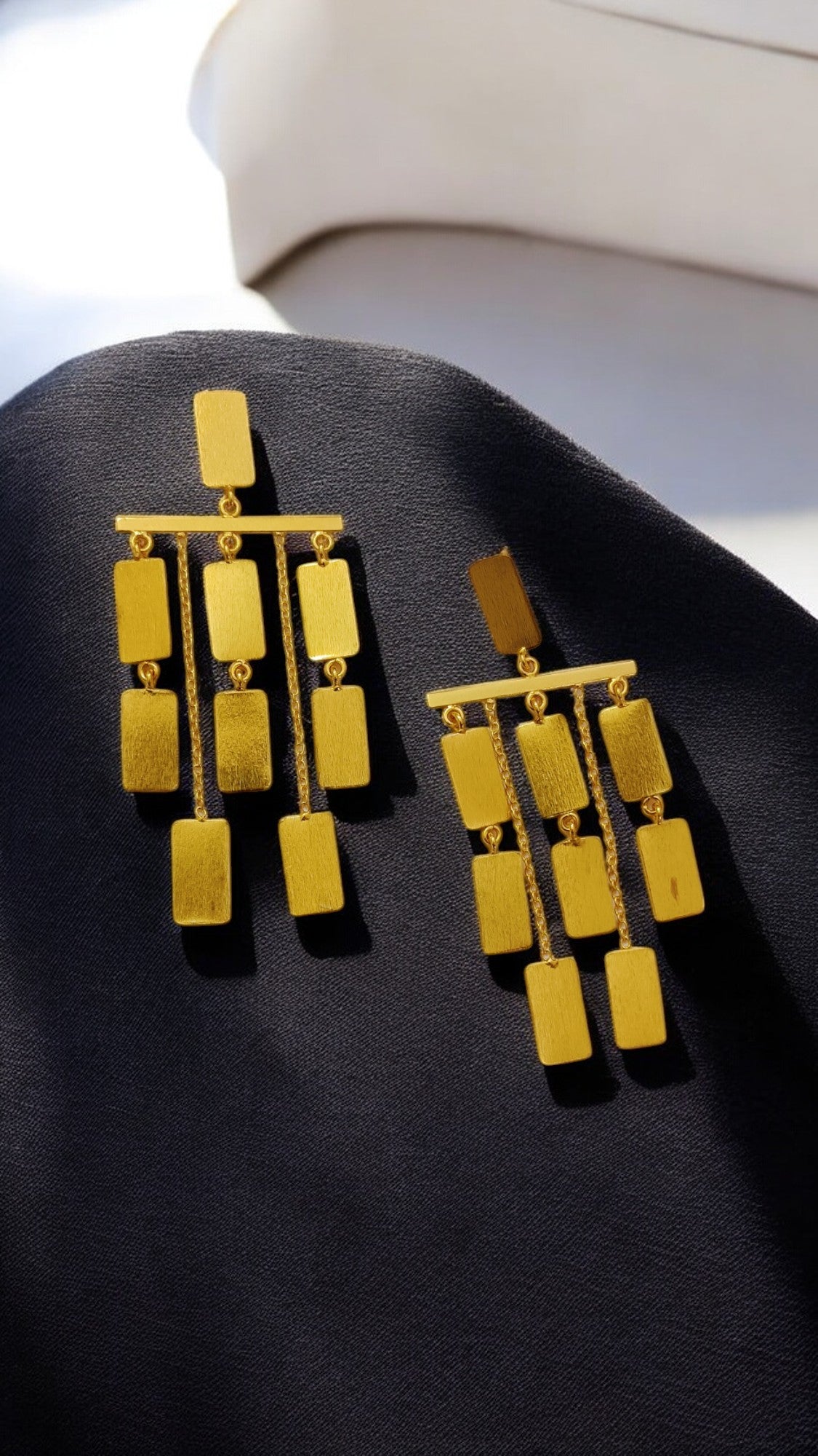 Gold-tone rectangular tile drop dangler earrings with three-tier chandelier design