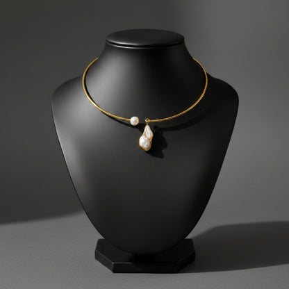 Hammered brass hasli necklace with baroque pearl