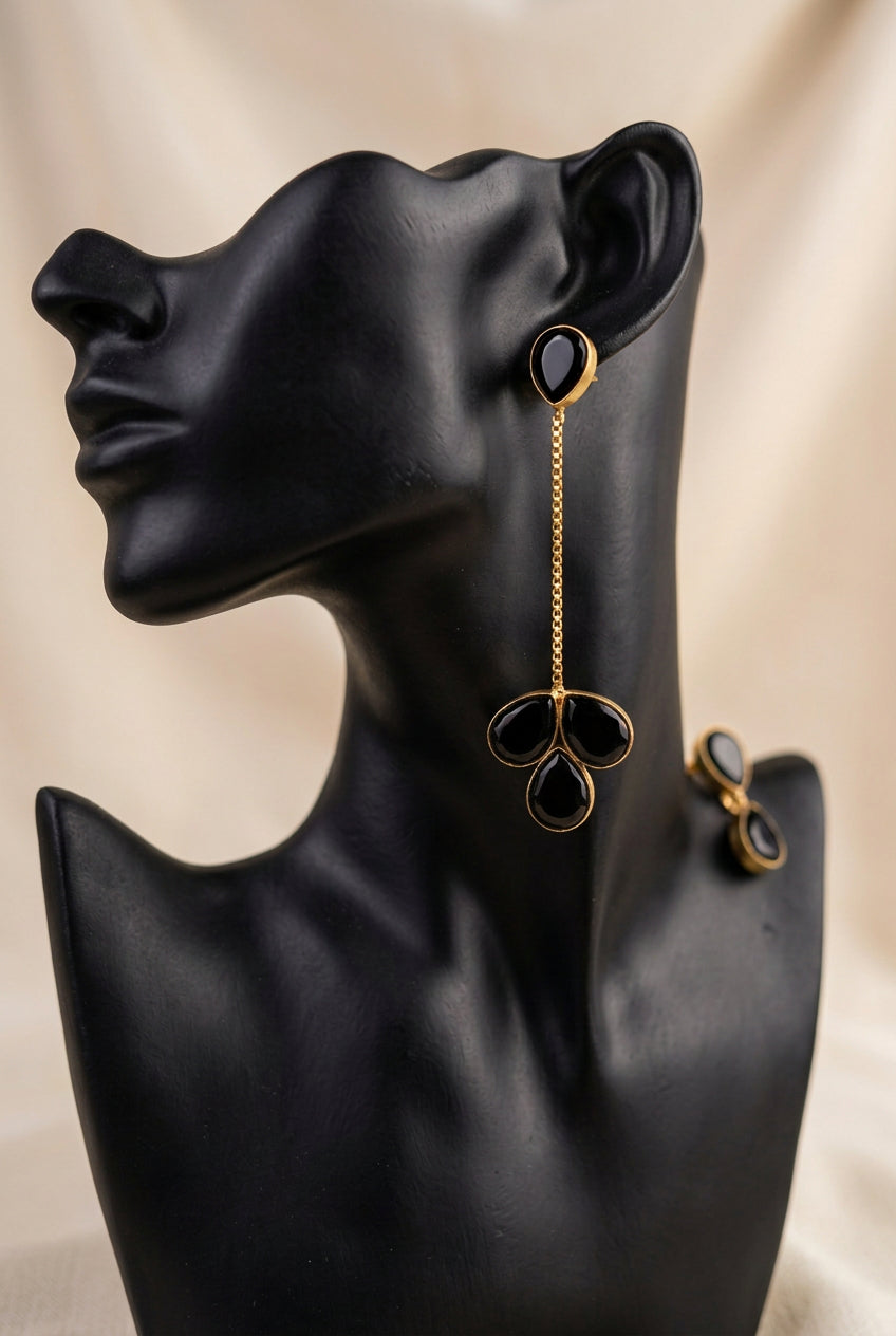 Long Golden Dangler with black stone made in brass