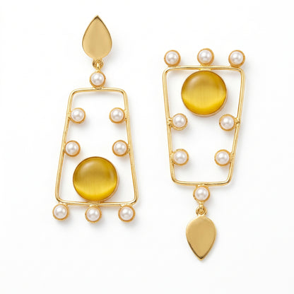 A pair of gold-tone dangle earrings with rectangular openwork frames, small white pearl beads, and round amber-yellow center stones.